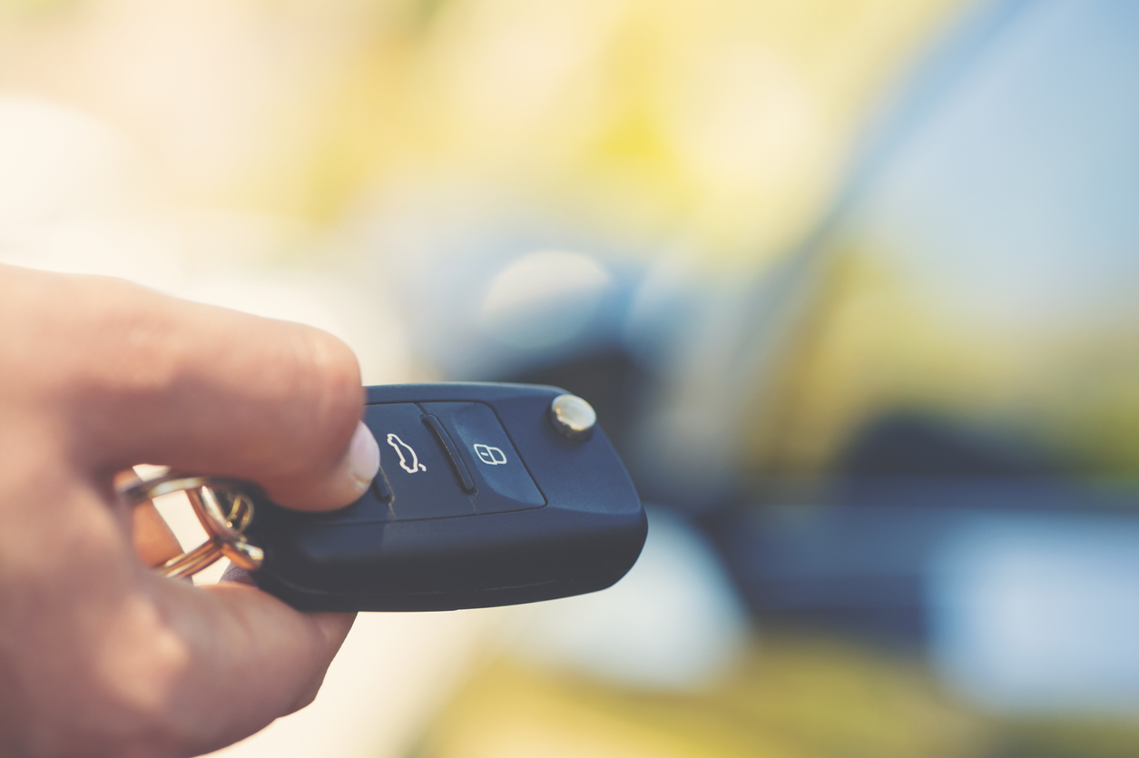 Car key unlocking car | vehicle buying trends