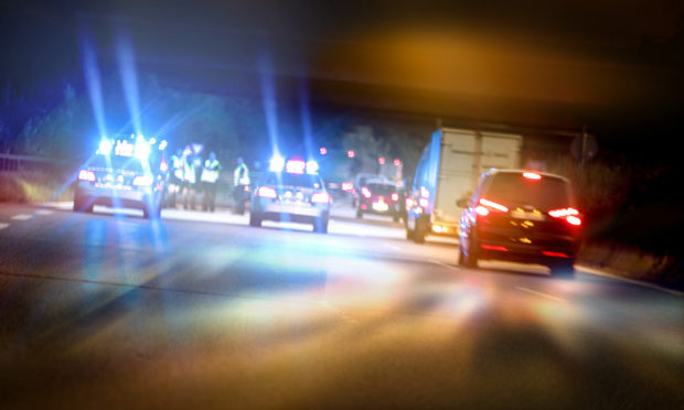 Drunk-driver-crashes-into-roadblock,-damages-two-patrol-cars_istock