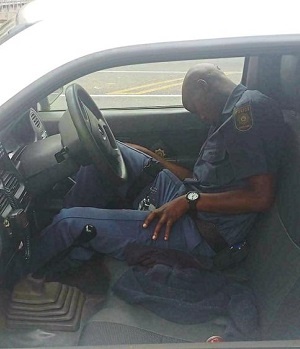 Drunk police officer - behind the wheel of police van