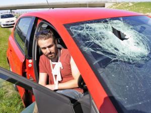 N2 Rock throwing - cracked windscreen injured man