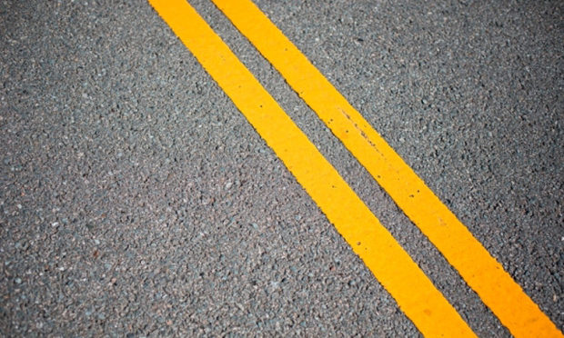 What all drivers need to know about driving in the yellow lane_istock