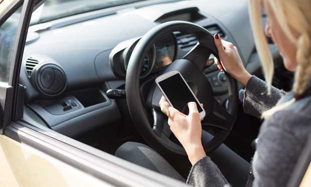 Using-phone-while-driving_istock
