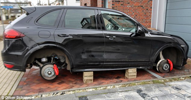 Car wheels stolen, propped up on bricks