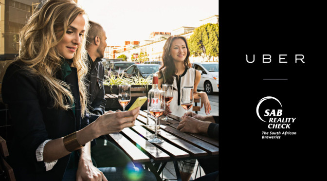 free uber pledge - people sitting around table using uber app